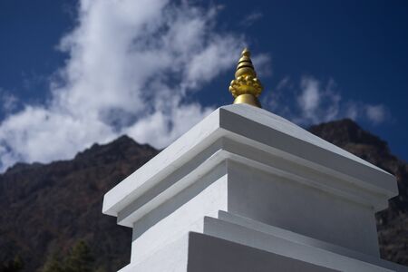 Buddhist stupa and lungta prayer flags in the Himalaya mountains, Annapurna region, Nepalの写真素材
