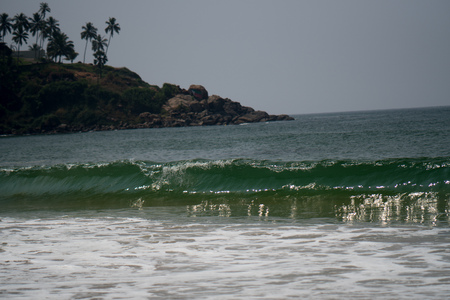 Ocean coast with waves and rocksの写真素材