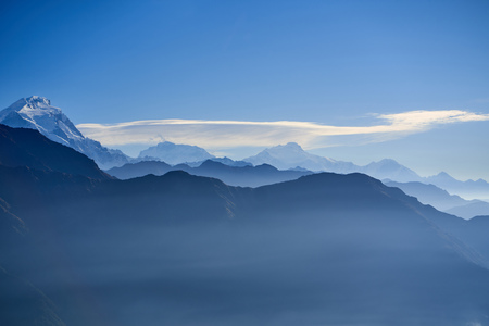 Fog above mountain in valley Himalayas mountainsの写真素材