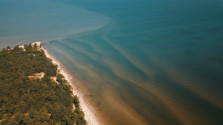 Aerial view of cape Kolka, Baltic sea, Latviaの写真素材