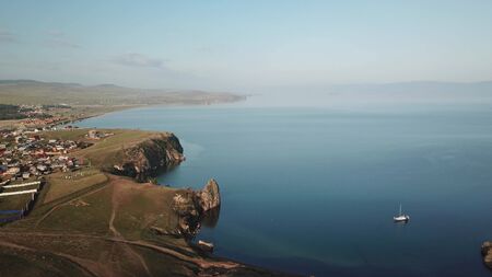 View above big beautiful lake, Baikal lake, Russia air video from droneの写真素材