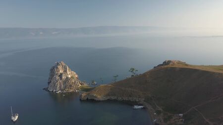 View above big beautiful lake, Baikal lake, Russia air video from droneの写真素材