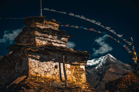 Buddhist gompa and prayer flags in the Himalaya mountains, Nepalの写真素材