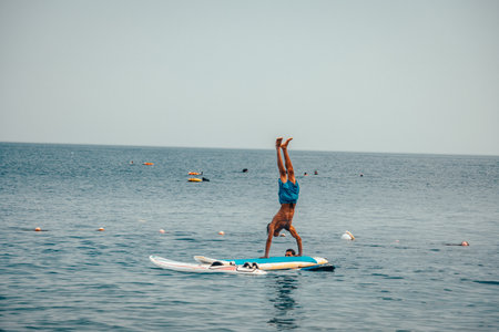 Kite surfing in Dahab Egypt. Exploring the blue water with mountainsの写真素材