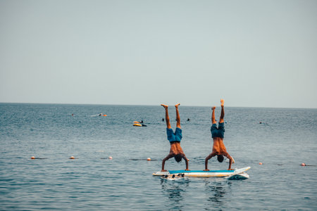 Kite surfing in Dahab Egypt. Exploring the blue water with mountainsの写真素材