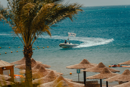 Kite surfing in Dahab Egypt. Exploring the blue water with mountainsの写真素材