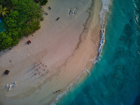 Tropical paradise with blue sea and green island in the maldives