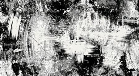 A chaotic and energetic abstract artwork featuring bold black and white brushstrokes, with a luminous white center.の素材