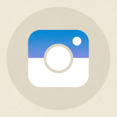 A stylized, minimalist Instagram logo featuring a gradient of blue and white, presented within a soft beige circular frame.の素材