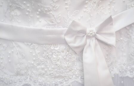 Beautiful white belt with bow fishnet wedding bridesmaid dressの写真素材