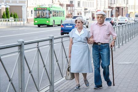 Russia, Kazan, July 23, 2018: an elderly old couple walking down the streetのeditorial素材