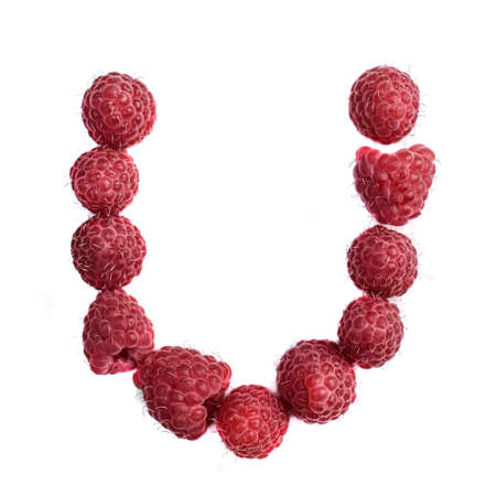 The letter U of the english alphabet of red ripe raspberries,, isolate on a white backgroundの写真素材