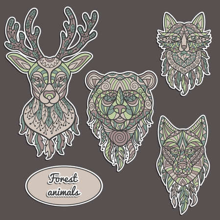A set of stickers with forest animals: deer, bear, wolf, fox in ethnic style with abstract patternsのイラスト素材