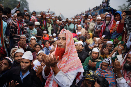 Muslims join at the first phase of Bishaw Ijtema, which concludes with the Akheri Munajat final prayers seeking world peace. It is the 2nd largest congregation of the Muslims after Holy Hajj. Tongi, Bangladesh.のeditorial素材