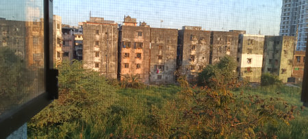 View from the window on the ruins of an old abandoned building.の写真素材