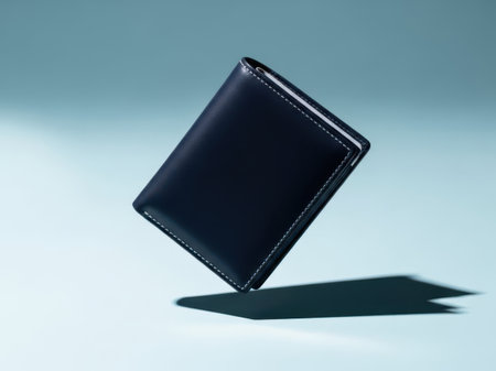 Black leather wallet isolated on white backgroundの素材