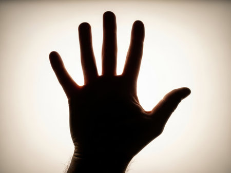 Silhouette of a hand, isolated on white backgroundの素材