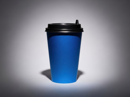 Blue coffee cup with lid isolated on white backgroundの素材