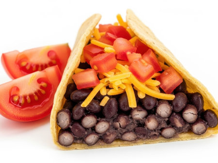 Bean taco with tomatoes and cheese isolated on white backgroundの素材