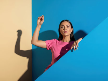 Woman exercising with dumbbells isolated on white backgroundの素材