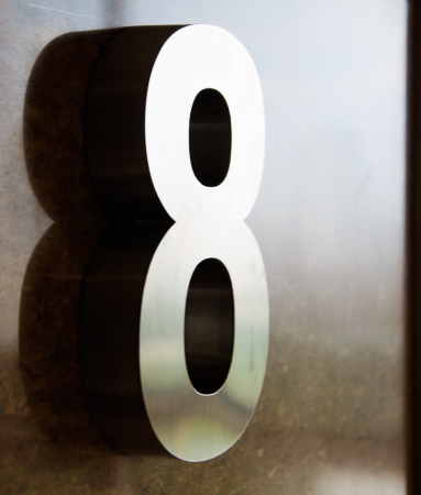 Nuber 8 reflection and shadow in buildingの写真素材