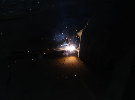 welder Welding Sparks  steel in factory
