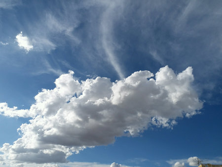 Dancing clouds in blue sky
