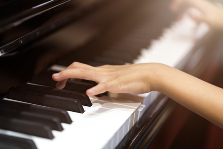 hand on pianoの写真素材