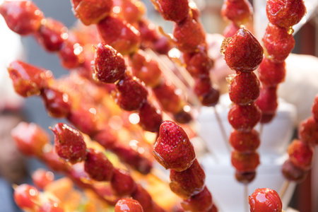 Sugarcoated haws on a stick