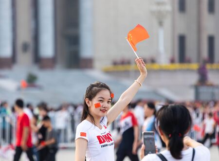BEIJING-October 3: Celebrate the national day on October 3, 2019 in Beijing, China. People celebrating China National Day in Tiananmen Square.のeditorial素材