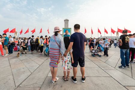BEIJING-October 3: Celebrate the national day on October 3, 2019 in Beijing, China. People celebrating China National Day in Tiananmen Square.のeditorial素材