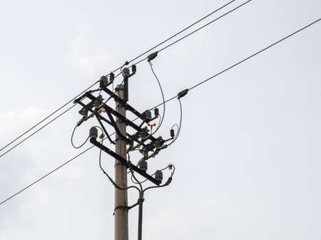 Utility pole and Power line Close upの写真素材