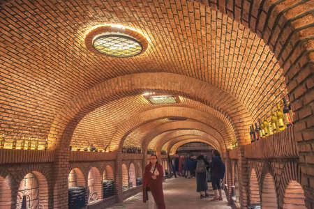 KVARELI, GEORGIA, Wine tasting  inside underground cold brick-wall tunnel, 27th August 2018, editorial use onlyのeditorial素材
