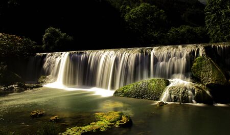 waterfalls at nightの写真素材