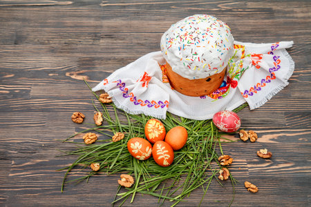 Homemade Easter cake and painted eggs on the table