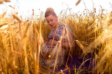 Young pregnant woman waiting for a child.の写真素材