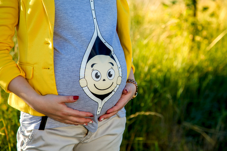 Young pregnant woman waiting for a child.の写真素材