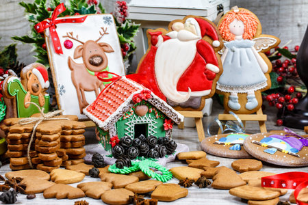 Christmas honey cakes with icing. Decoration of the gingerbread bake