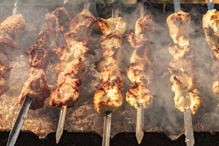 Kebabs on the grill smokeの写真素材