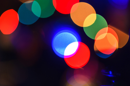Christmas abstract blurred background. Multi-colored lights. Unfocused imageの写真素材