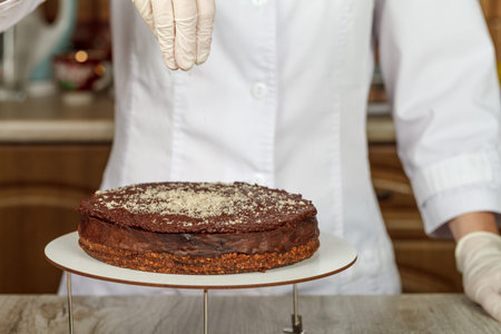 The concept of healthy eating. Tiramisu cake without sugar with cut pieces on a wooden surface