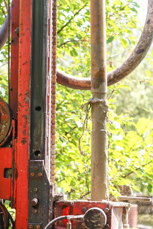 Metal construction for further use in the vineyard. The pipes are painted red with primer. Metal...