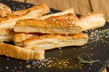 Sticks with sesame and cumin. Homemade cheese sticks. home baking appetizersの写真素材