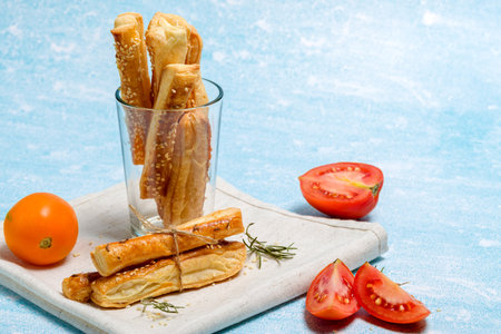 Sticks with sesame and cumin. Homemade cheese sticks. home baking appetizersの写真素材