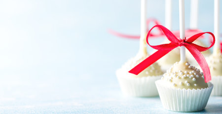 Cake pops. Sweets for Valentines Day. Round candies with red velvet. Banner.