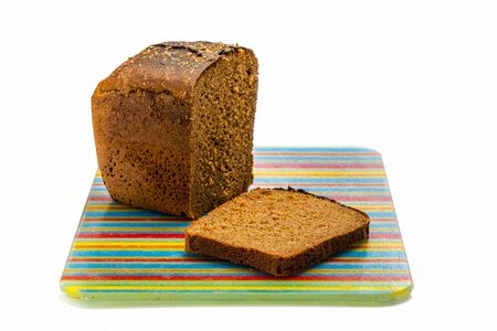 brown bread on a cutting boardの写真素材