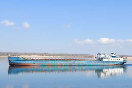 Cargo transportation. Cargo ship on the Volga river in Russia. Volga-Don shipping canal in...