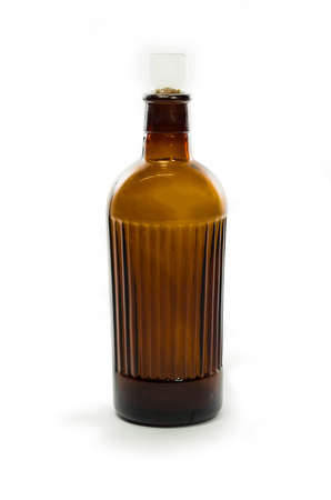 Vintage medical bottle of dark brown glassの写真素材