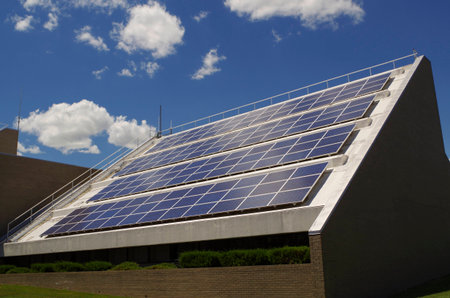 Solar pannels against a blue sky.