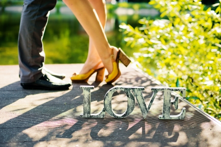 the word Love over a foot loversの写真素材